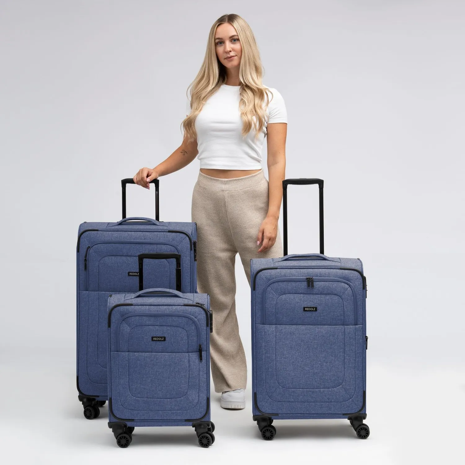 Redolz Essentials 12 THREE SET 4 ruote Set di valigie 3 pezzi con piega di espansione